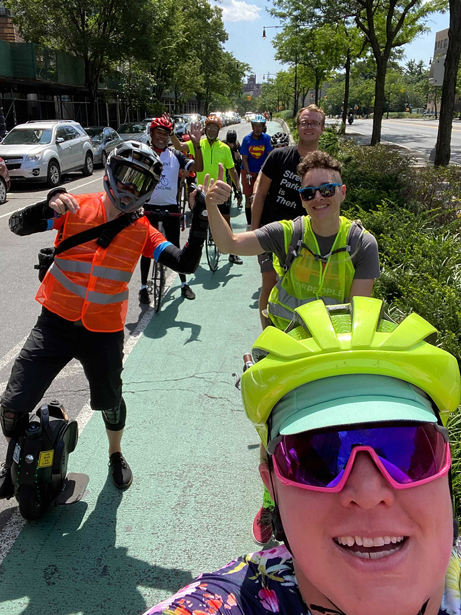 Activists riding down a bike lane